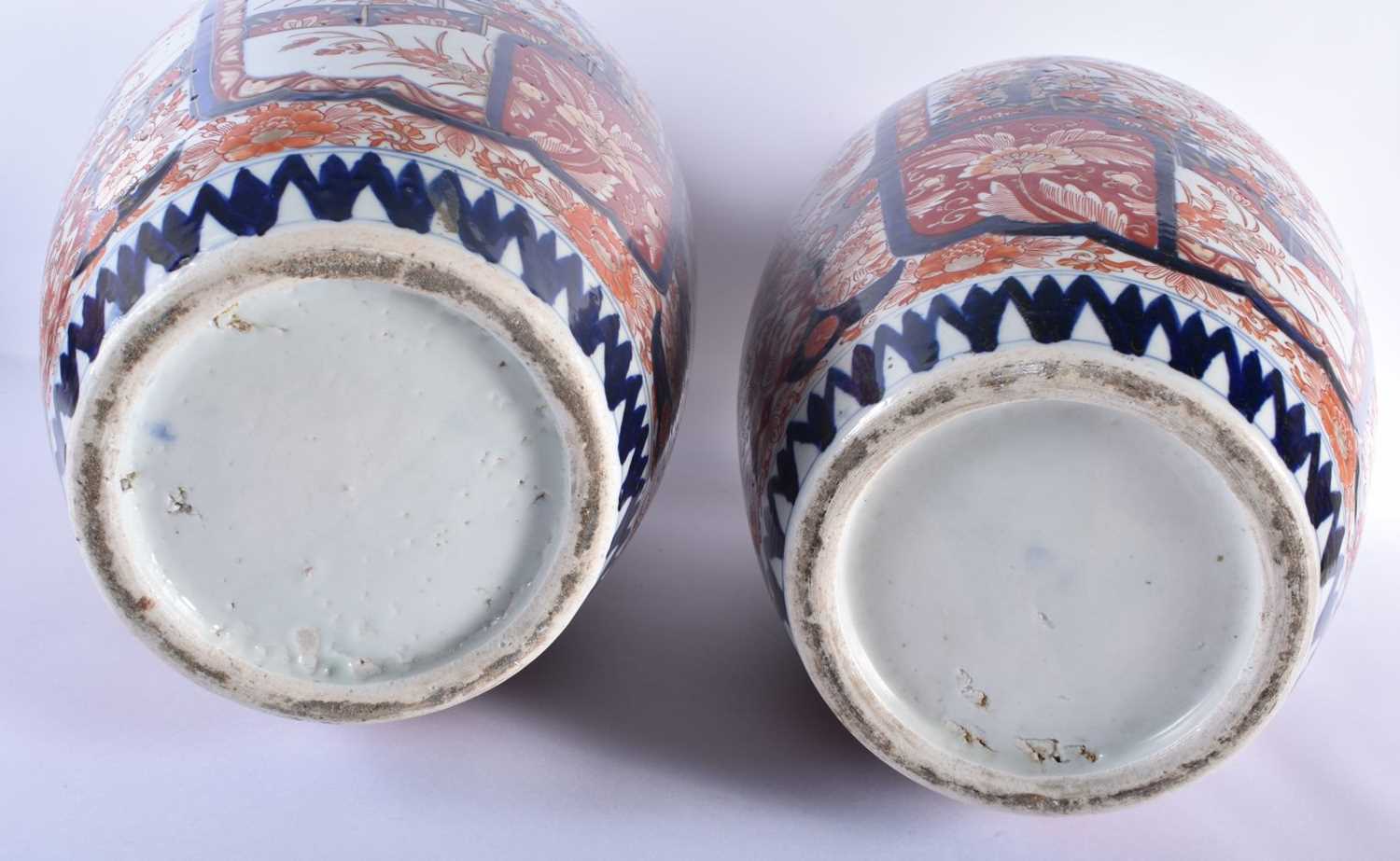 A LARGE PAIR OF 19TH CENTURY JAPANESE MEIJI PERIOD COUNTRY HOUSE IMARI VASES painted with foliage - Image 6 of 6
