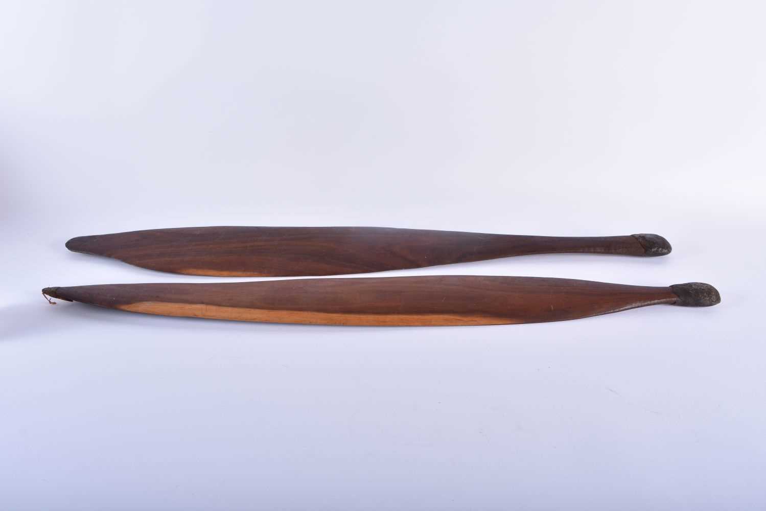 TWO ABORIGINAL TRIBAL CARVED WOOD SHORT PADDLES engraved with motifs. 70 cm long. (2) - Image 4 of 5