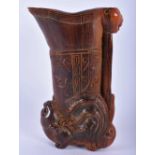 A CHINESE CARVED BUFFALO HORN TYPE LIBATION CUP 20th Century. 11cm x 7 cm.