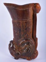 A CHINESE CARVED BUFFALO HORN TYPE LIBATION CUP 20th Century. 11cm x 7 cm.
