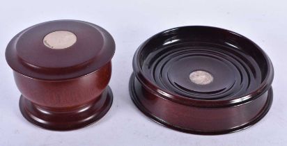 A Treen Bowl and Cover and a Treen Coaster by Piers Hart both with vacant Silver Cartouche both