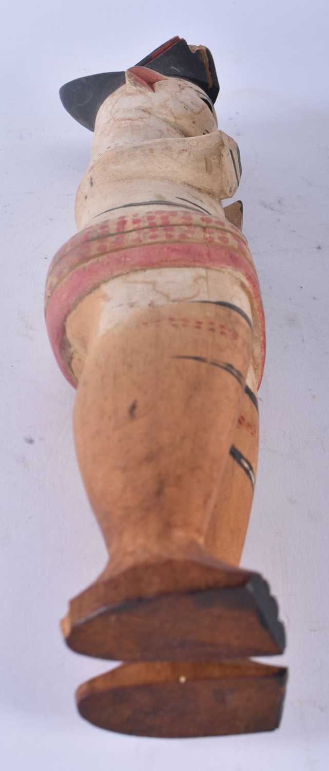 AN UNUSUAL AFRICAN TRIBAL PAINTED WOOD FIGURE modelled with hands covering her breasts. 30cm high. - Image 4 of 4