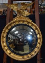A gilt wood framed Regency style mirror 79 x 55 cm