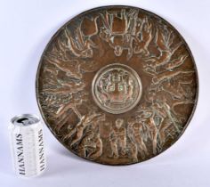 A LARGE 19TH CENTURY EUROPEAN BRONZE CLASSICAL SHIELD CHARGER decorated with Romanesque scenes, of