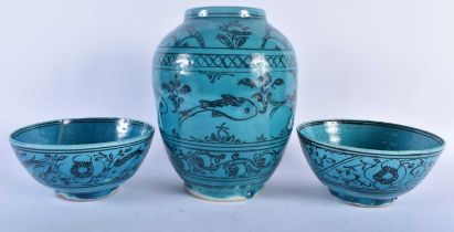 A PERSIAN SAFAVID TURQUOISE GLAZED POTTERY VASE together with a similar bowls. Largest 22 cm x 15