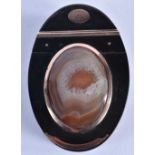 A Regency Period Tortoiseshell Snuff Box with Gold Mounts. The Lid is set with a Polished Agate. 7.8