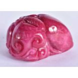 A CHINESE CARVED TOURMALINE PEACH FRUITING POD 20th Century. 147.3 grams. 5.5 cm x 4.5 cm.