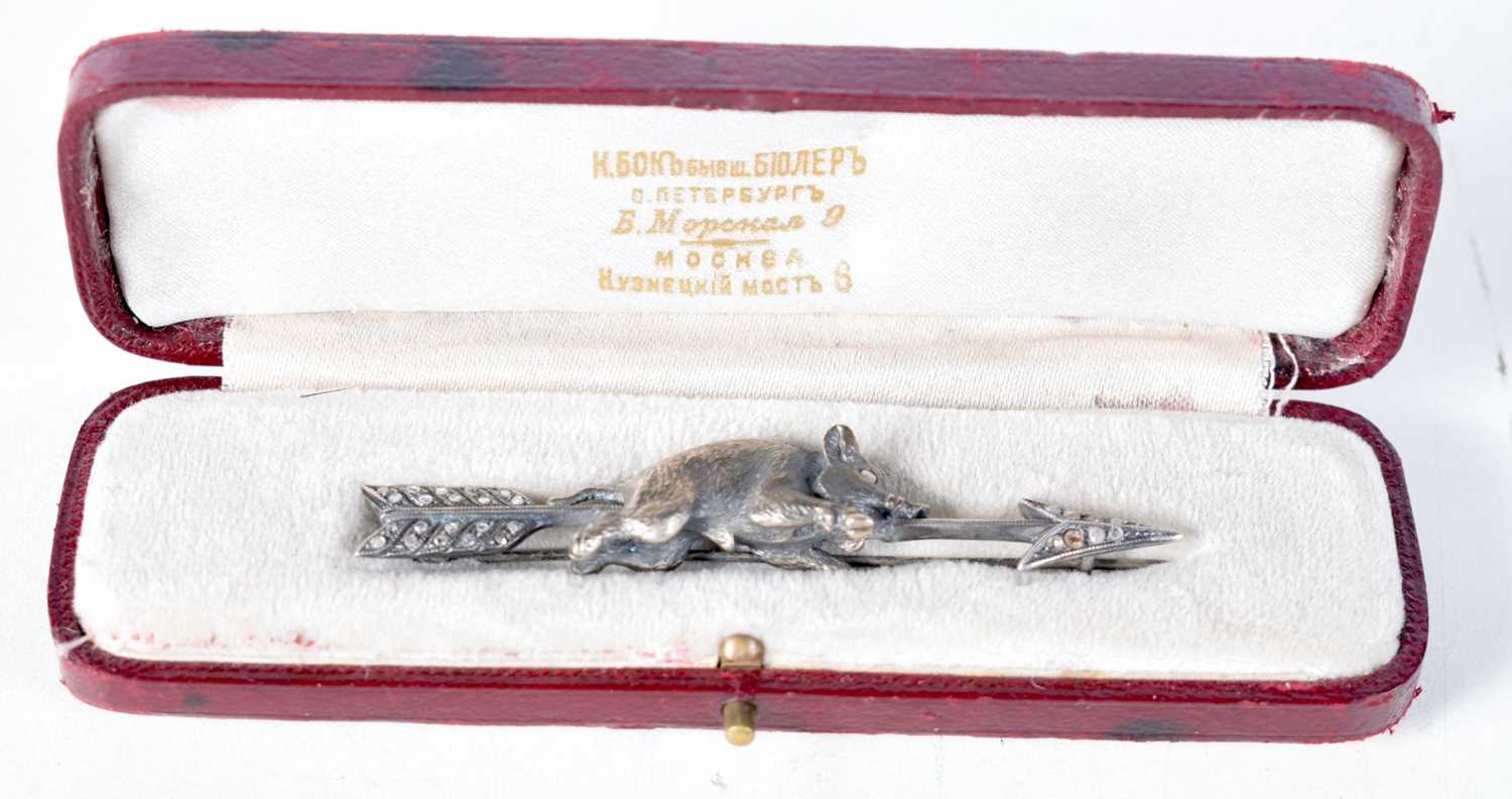 A Russian Silver Pig and Arrow Brooch set with Diamonds in a fitted leather case. Russian Marks. 7.3
