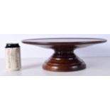 An antique mahogany Lazy Susan 38 x 13 cm.