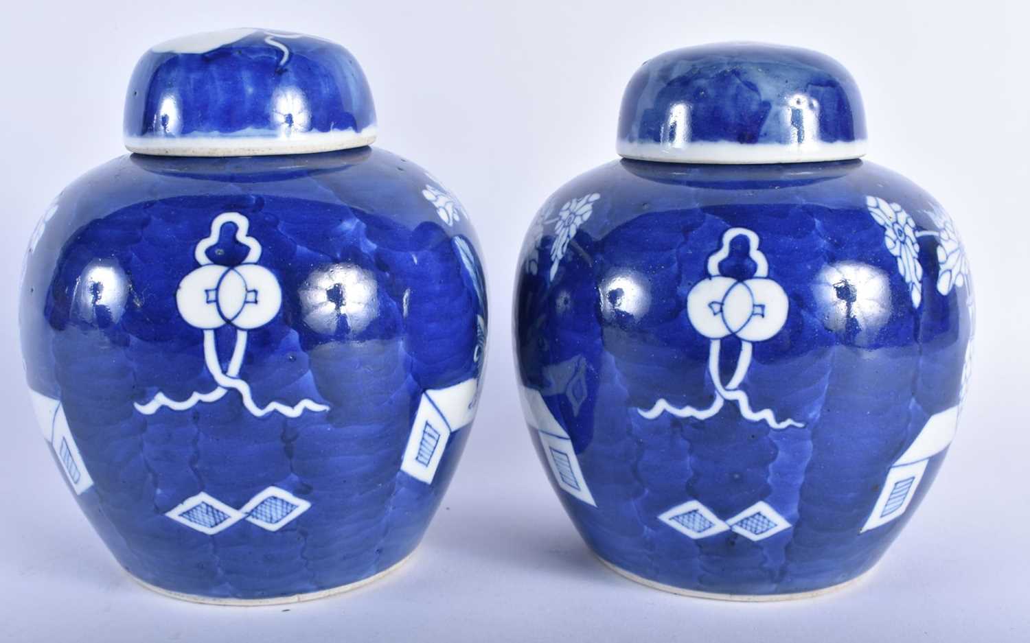 AN UNUSUAL PAIR OF 19TH CENTURY CHINESE BLUE AND WHITE PORCELAIN GINGER JARS AND COVERS Kangxi - Image 2 of 5