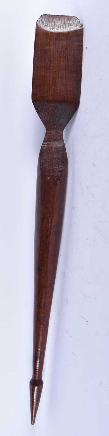 A TRIBAL CARVED WOOD CLUB. 64 cm long. - Image 2 of 4