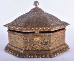 AN 18TH CENTURY ISLAMIC OTTOMAN INDIAN GOLD INLAID IRON BOX of octagonal form, decorated all over