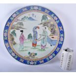 A 19TH CENTURY JAPANESE MEIJI PERIOD PORCELAIN PLATE painted with three figures. 34 cm diameter.