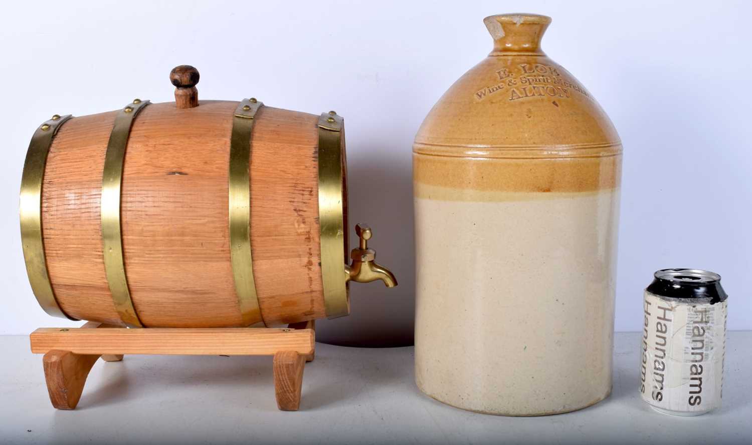 A small brass bound wooden wine barrel on a fitted stand together with a E Loe stoneware flagon 30 x - Image 2 of 10