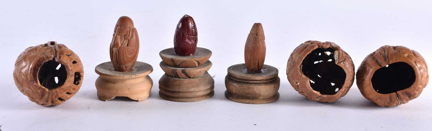 A COLLECTION OF 19TH/20TH CENTURY CHINESE CARVED NUTS Late Qing, in various forms and sizes. 5 cm - Image 6 of 7