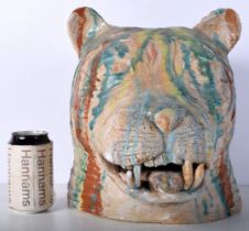 A large pottery Tigers head 31 x 28 cm.