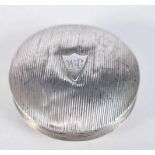 A Silver Snuff Box with Engine Turned Decoration.and Engraved Cartouche. Stamped with indistinct