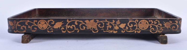 AN 18TH/19TH CENTURY JAPANESE EDO PERIOD BLACK LACQUER TRAY with gold overlaid floral decoration. 24