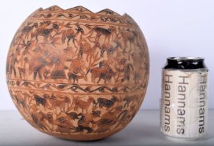 An elaborately carved Peruvian Gourd 18cm