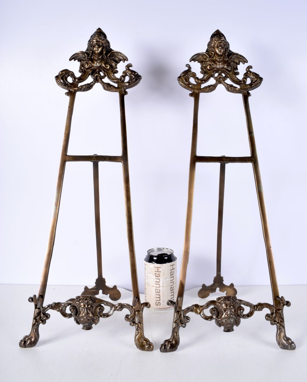 A pair of brass easels 59 x 23 cm (2)