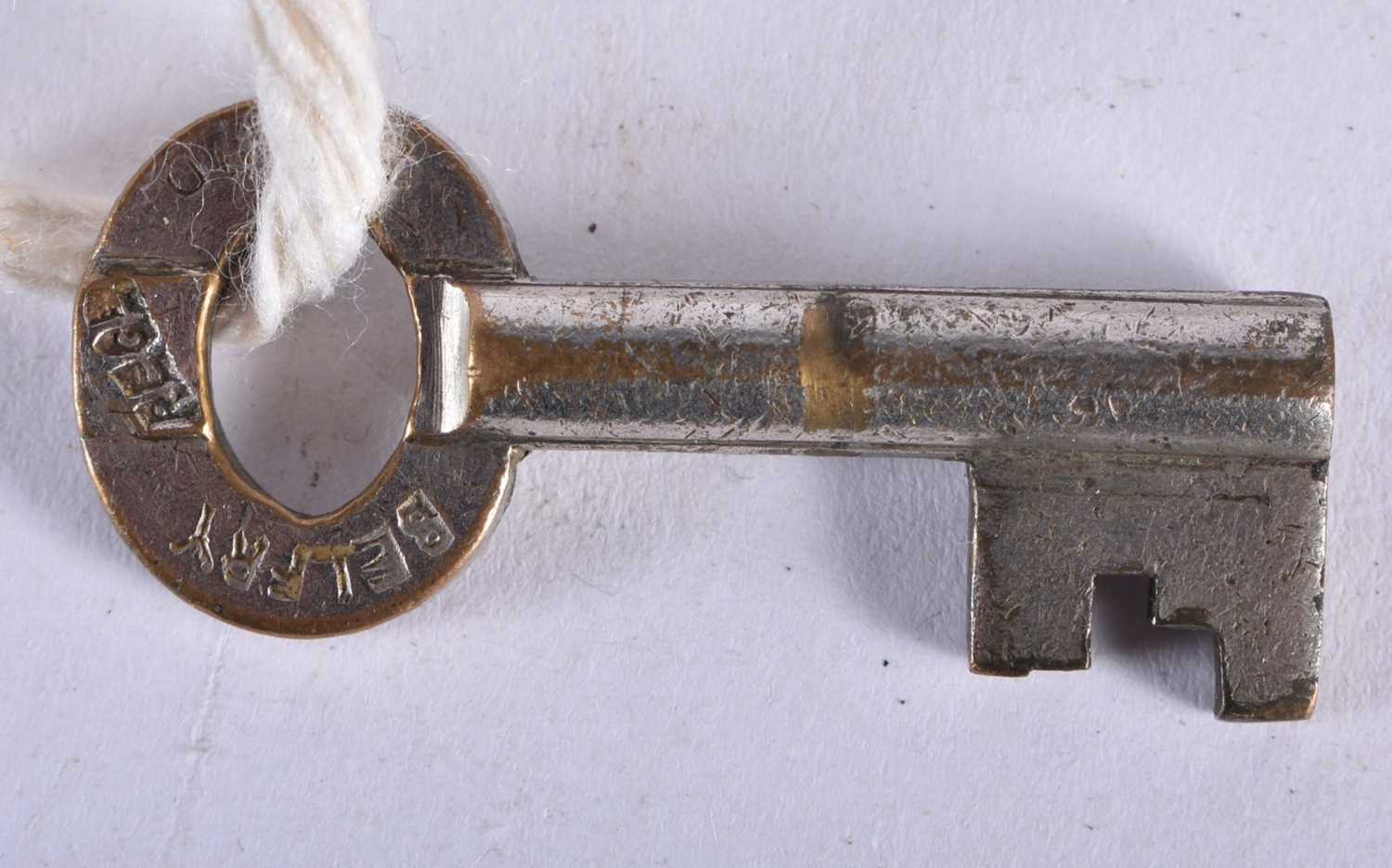 A PAIR OF ANTIQUE HANDCUFFS together with a similar padlock. Largest 24 cm long. (3) - Image 5 of 7