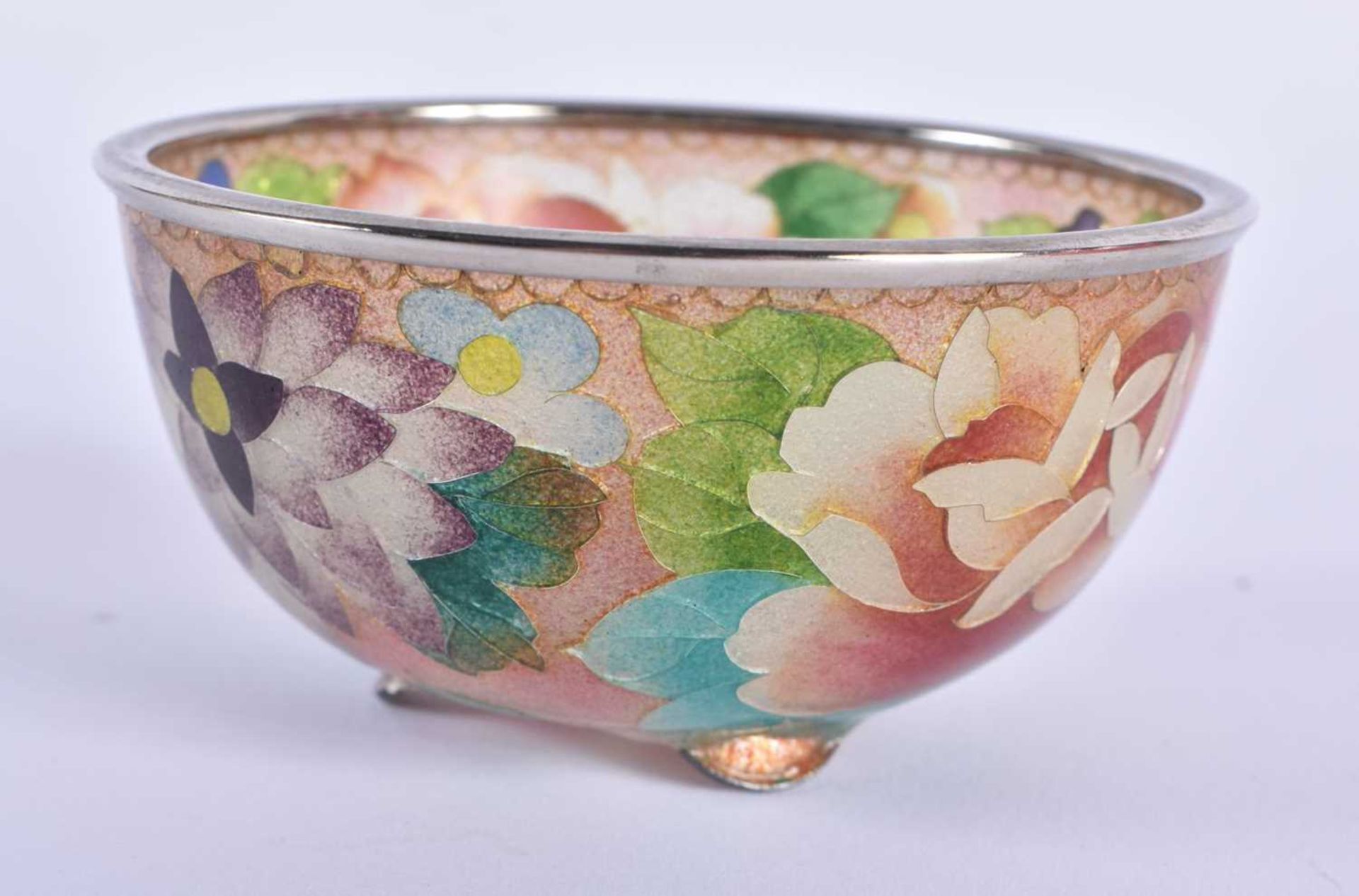 A JAPANESE TAISHO PERIOD PLIQUE A JOUR ENAMEL BOWL. 9 cm diameter.