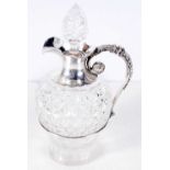 A Cut Glass Claret Jug with Silver Mounts. Possible by Wilkinson & Roberts. Hallmarked Sheffield