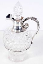 A Cut Glass Claret Jug with Silver Mounts. Possible by Wilkinson & Roberts. Hallmarked Sheffield