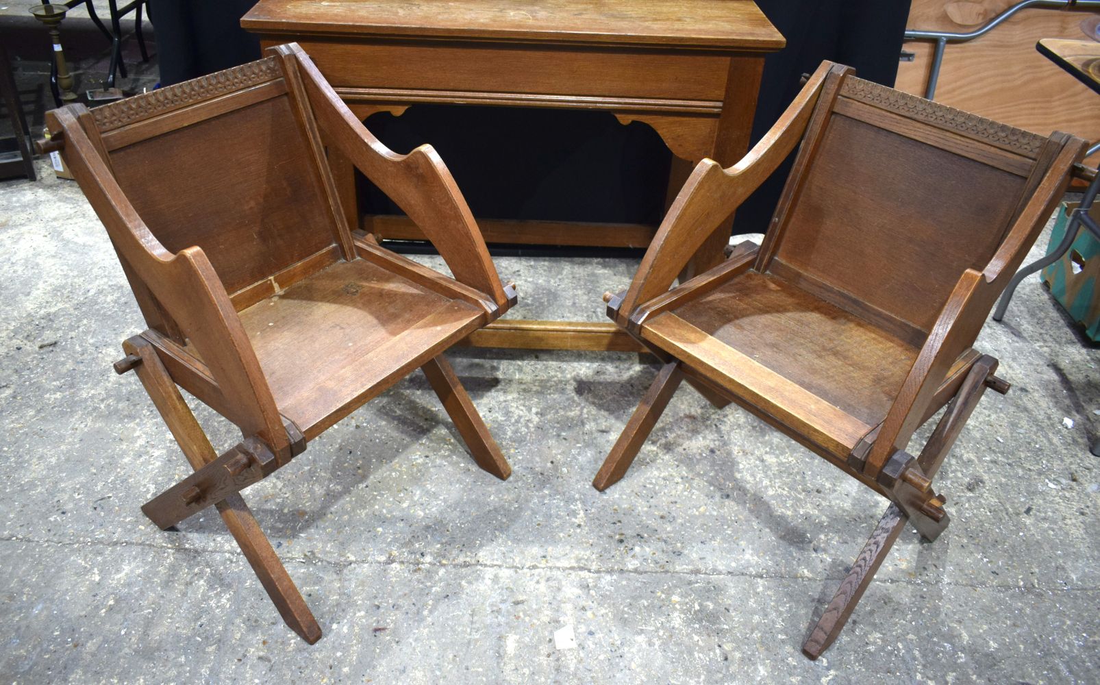 An early 20th Century Oak table with 2 Glastonbury Oak chairs 87 x 107 cm(3).