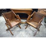 An early 20th Century Oak table with 2 Glastonbury Oak chairs 87 x 107 cm(3).