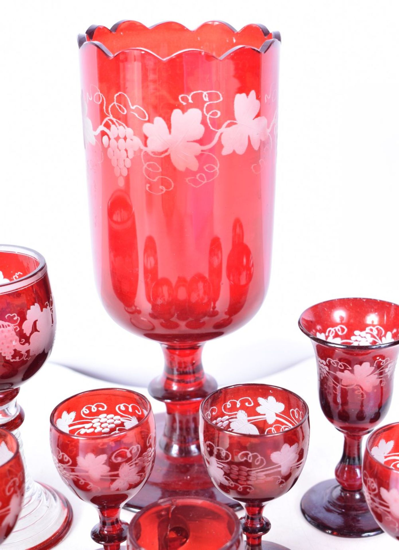 A collection of 1950's Bohemian Ruby wine glasses engraved with a Floral pattern together with a - Image 7 of 8