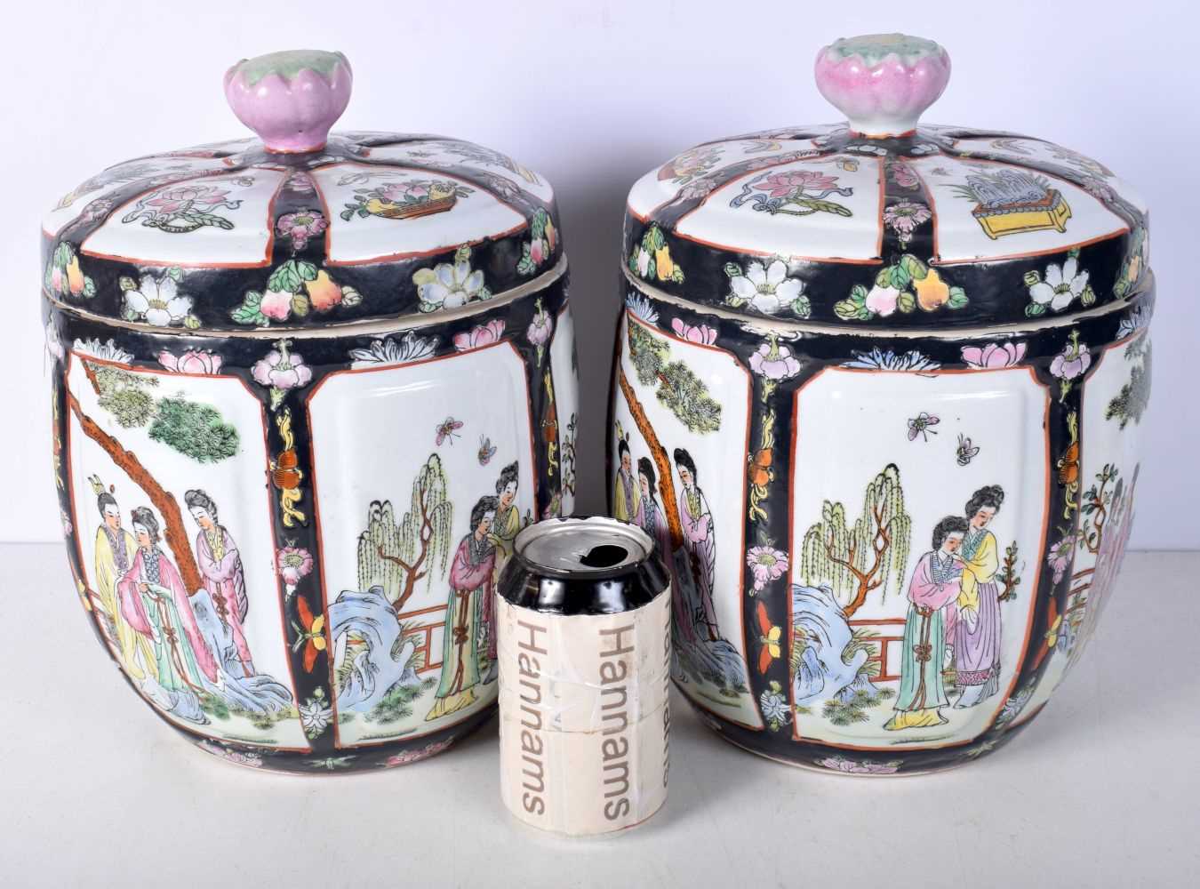 A pair of Chinese porcelain polychrome lidded jars decorated with figures in panels 28cm (2). - Image 2 of 10