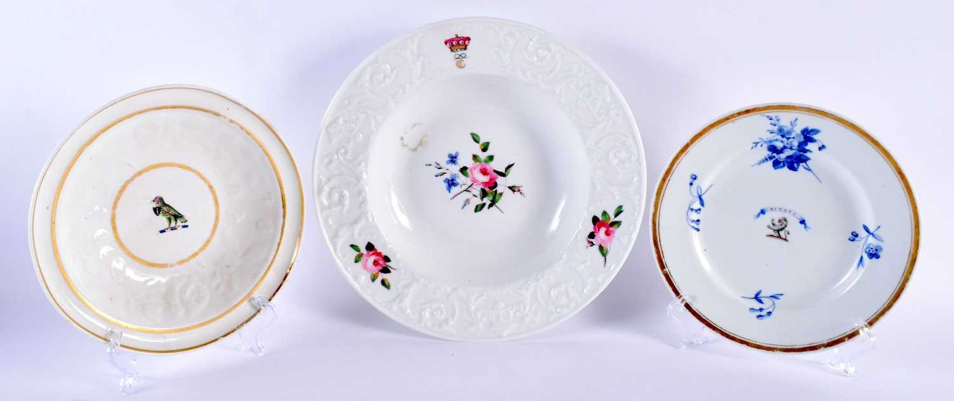 AN EARLY 19TH CENTURY CHAMBERLAINS WORCESTER MOULDED ARMORIAL PORCELAIN BOWL together with two other