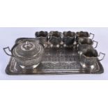 AN ANTIQUE PERSIAN IRANIAN SILVER TEASET ON TRAY. 1158 grams. Largest 32 cm x 22 cm. (8)