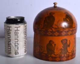 A lidded Indian wooden box decorated with animals 15 cm.