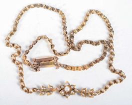 A VICTORIAN 15CT GOLD AND PEARL NECKLACE. 12.1 grams. 39 cm long.
