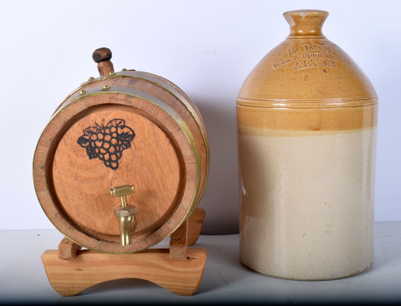 A small brass bound wooden wine barrel on a fitted stand together with a E Loe stoneware flagon 30 x - Image 7 of 10