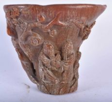 A CHINESE CARVED BUFFALO HORN TYPE LIBATION CUP 20th Century. 718 grams. 13 cm x 13 cm.