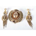 A Victorian Antique Gold Suite of Mourning Jewellery consisting of Brooch and Matching Earrings.