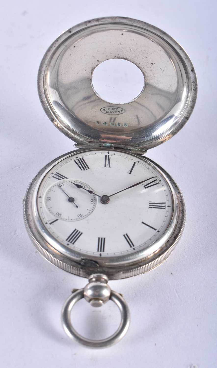 A Fine Silver Cased Half Hunter Pocket Watch. Case Stamped Fine Silver. 4.6 cm diameter, weight 78. - Image 3 of 4