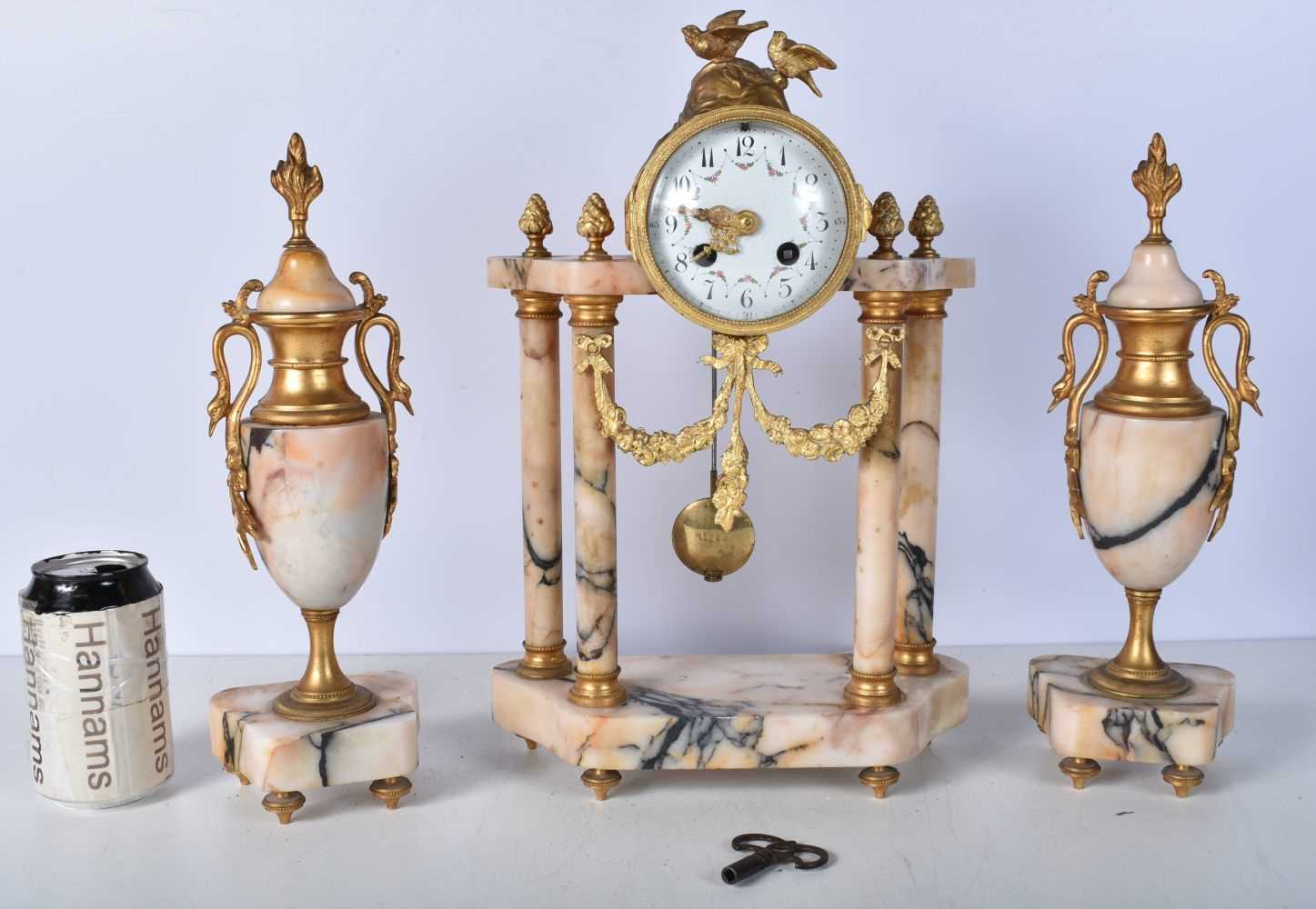 An early 20th Century French gilt metal and marble Clock set with a metal enamelled clock face - Image 2 of 6