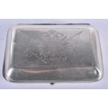 A Continental Silver Tobacco Tin with paper holder. with engraved lid depiction the emblem of the