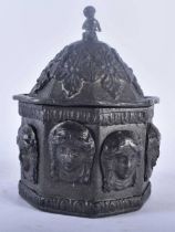 AN EARLY 19TH CENTURY LEAD TOBACCO BOX AND COVER decorated in relief with classical mask heads. 17