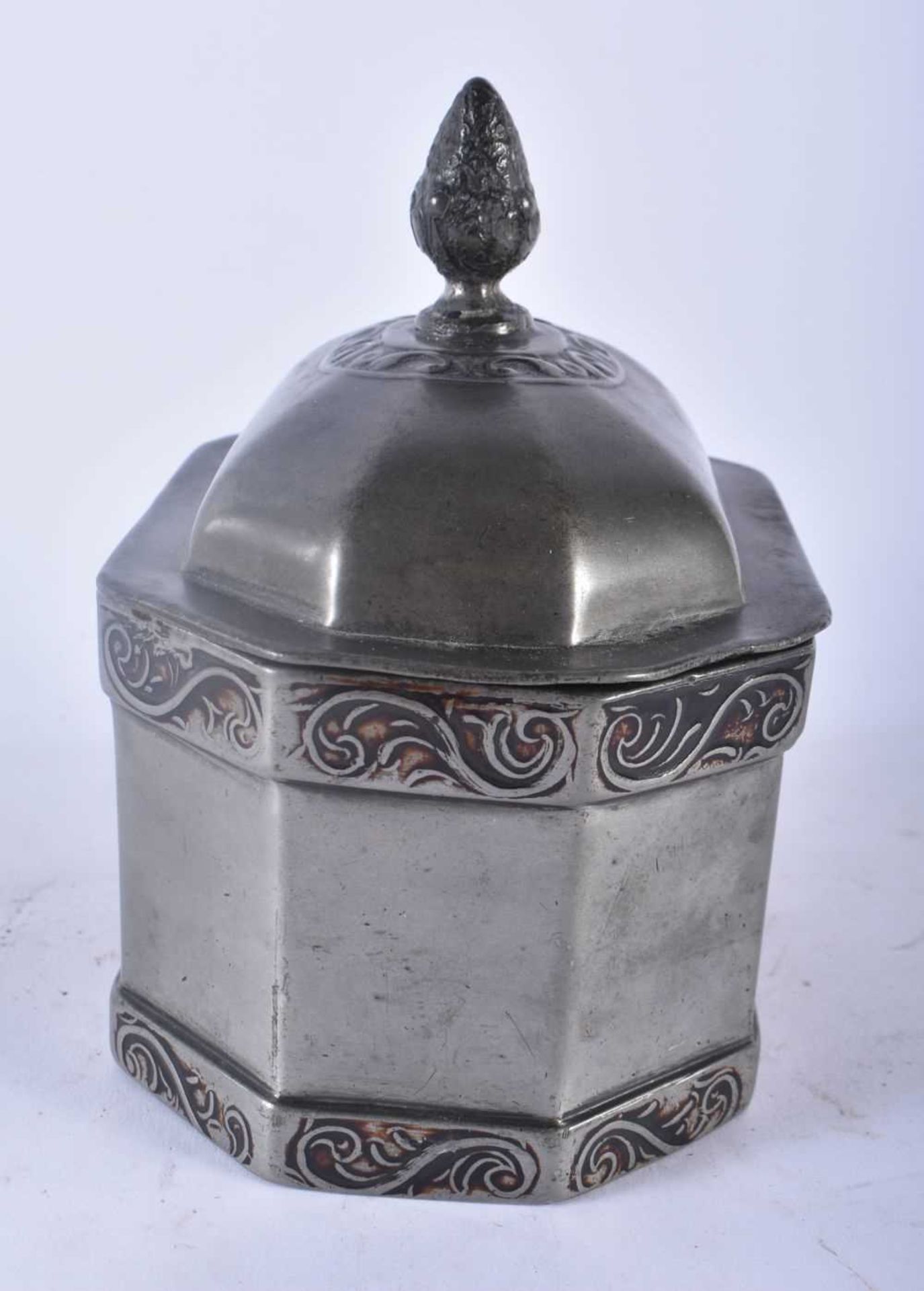 AN UNUSUAL ANTIQUE PEWTER TOBACCO BOX AND COVER engraved with a scene of a tribal male smoking a - Image 2 of 4