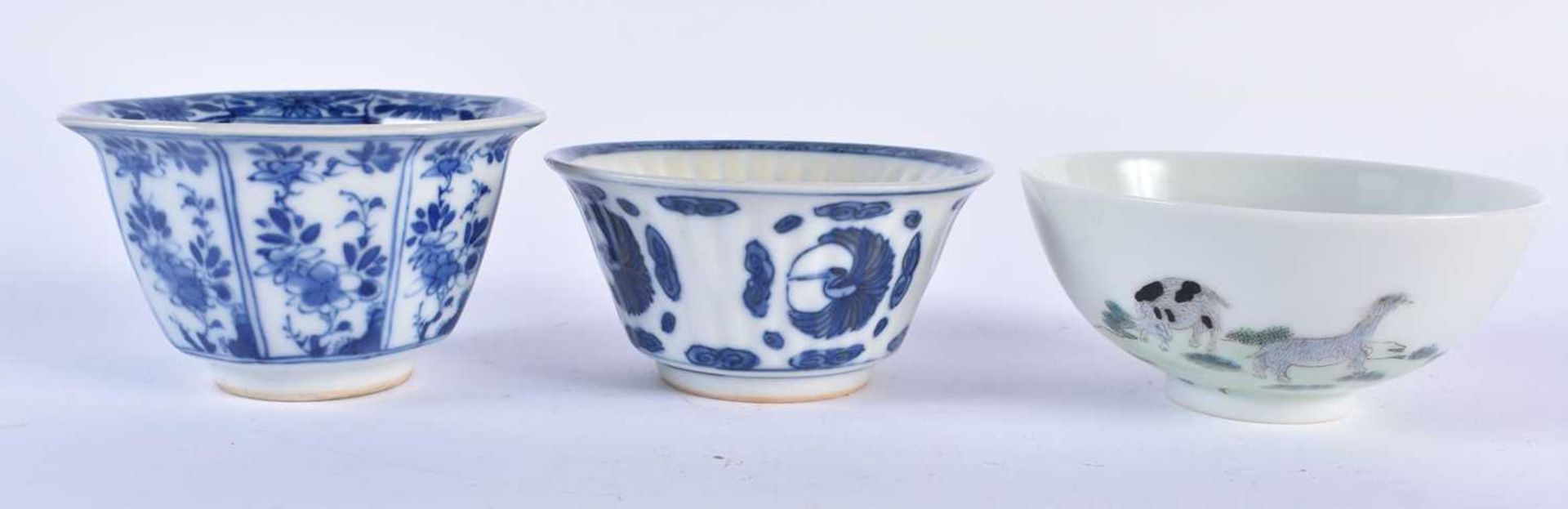 TWO CHINESE QING DYNASTY BLUE AND WHITE TEABOWLS together with another. Largest 9.5 cm diameter. (