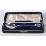 A Cased Mappin & Webb Silver and Enamel Spoon. Hallmarked Birmingham, 11.2 cm x 2.7cm, weight 12.1g