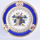 A FINE EARLY 19TH CENTURY CHAMBERLAINS WORCESTER ARMORIAL PLATE painted with a Knight and shield