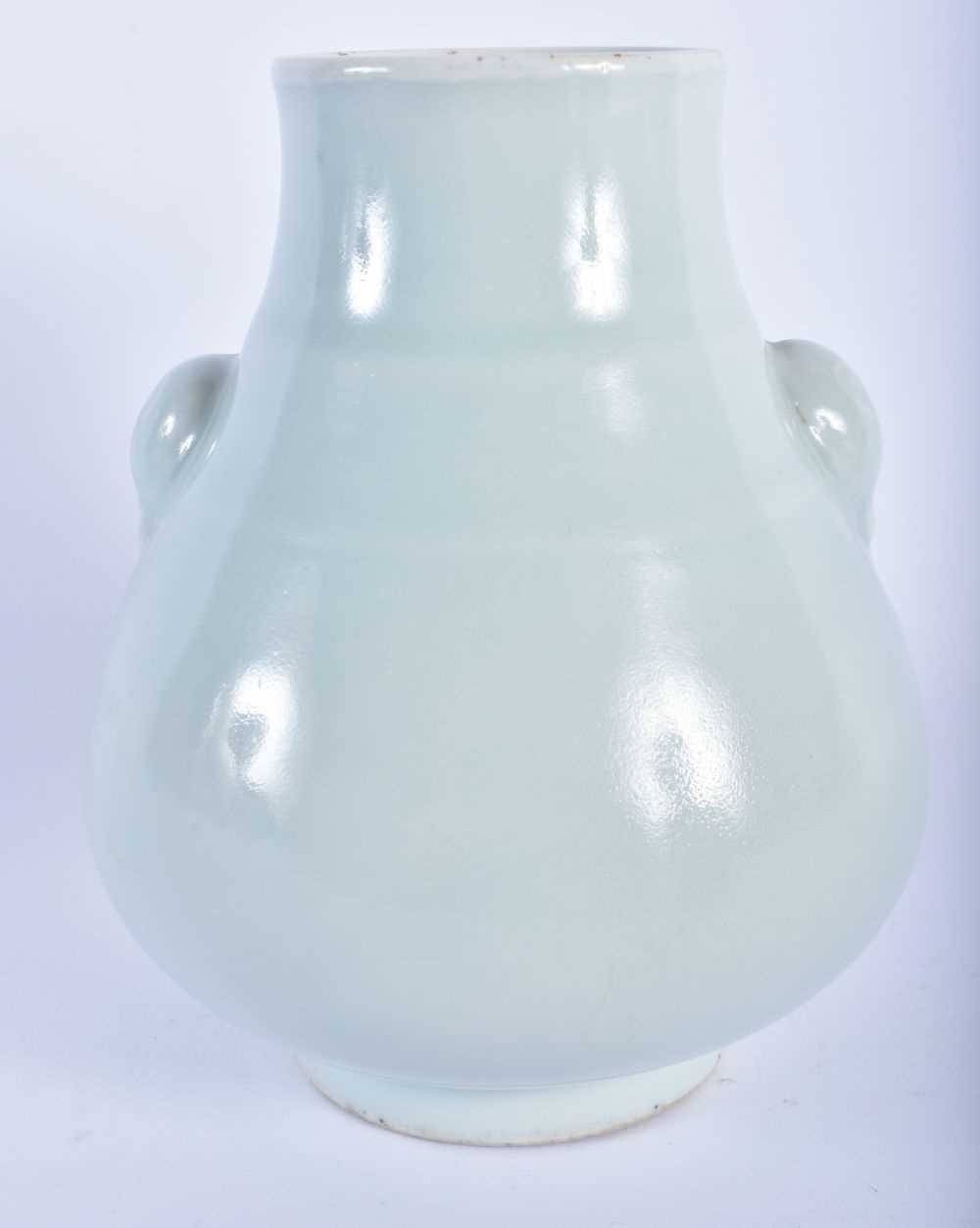 A CHINESE QING DYNASTY PALE CELADON GLAZED PORCELAIN HU VASE bearing Zhengde marks to base. 15.5 - Image 3 of 21