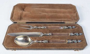 A Cased Christening Set with Rock Crystal Handles and Silver and Enamel Mounts. Knife 22cm long.