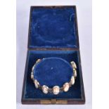 A Cameo Bracelet in a fitted case. 16cm x 1.6 cm, weight 13.5g